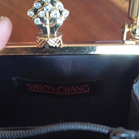 Classy Simon Chang Multicolor Handbag with Gold Accents. Great Condition. - Picture 3 of 11